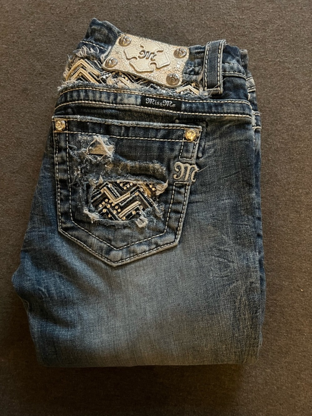 Miss Me Women's Distressed Dark Blue Jean. Size 27. Signature ankle skinny